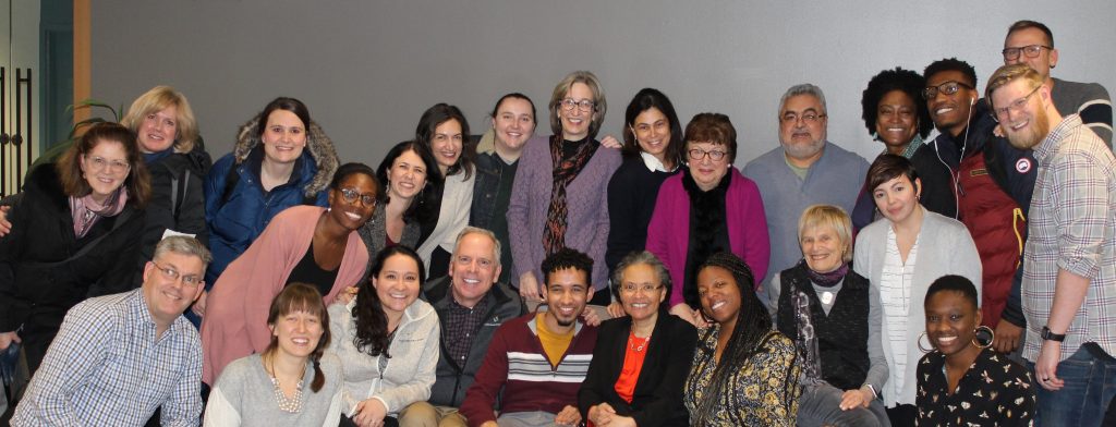 group photo of HRiA staff and board members after a talk by Dr. Camara Jones