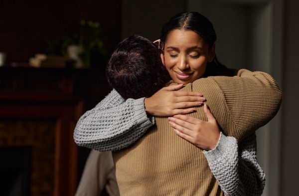 Two women hugging